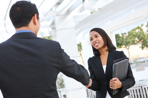 Student Counsellor Shakes Employers Hand After Graduating The Online Counselling Training