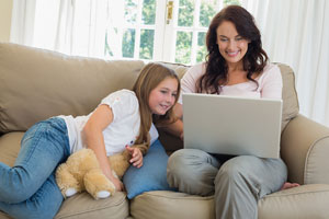 Mom with child studying at home